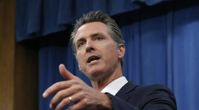 California governor announces deal to cap rising rent prices