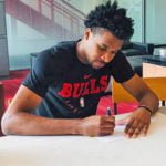 Simon signs Exhibit 10 contract with Chicago Bulls