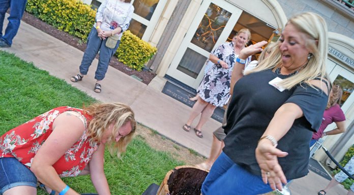 Hundreds stomp grapes at South Coast’s annual event