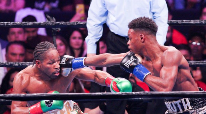 Spence beats Porter, gets 2 belts in split-decision thriller