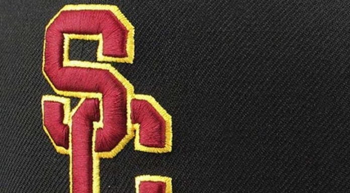 Slovis throws for record 515 yards, USC holds off UCLA 52-35