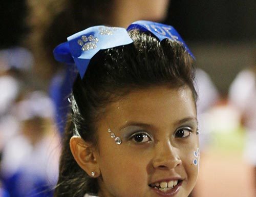 Junior cheerleaders perform at HHS Bobcat home football game
