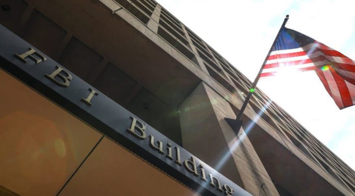 Head of FBI press office accepted baseball tickets from CNN and New York Times reporters, lied under oath