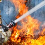 Fire erupts in homeless encampment adjacent to 60 freeway
