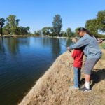Smokey leads the way at the Boy Scout Fishing Day competition