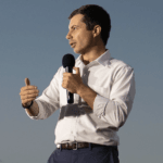 Buttigieg touts military service, wary of overstating role