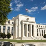 Fed’s Powell sees steady growth, signals pause in rate cuts