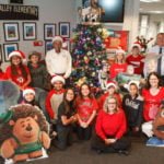Supervisor Chuck Washington presents holiday-themed tree to Nicolas Valley Elementary