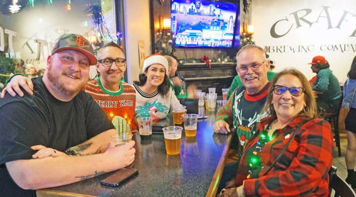 Craft beer lovers scour old town at Ugly Sweater Beer Crawl