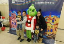 The Grinch helps children find green presents in Winchester’s Francis Domenigoni Community Center