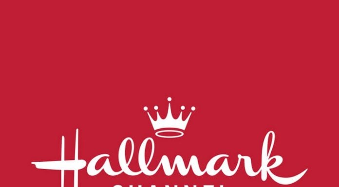 Under pressure, Hallmark pulls gay-themed wedding ads