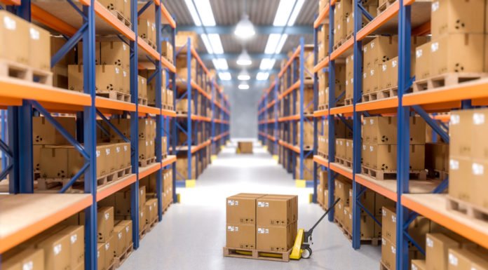 As robots take over warehousing, workers pushed to adapt