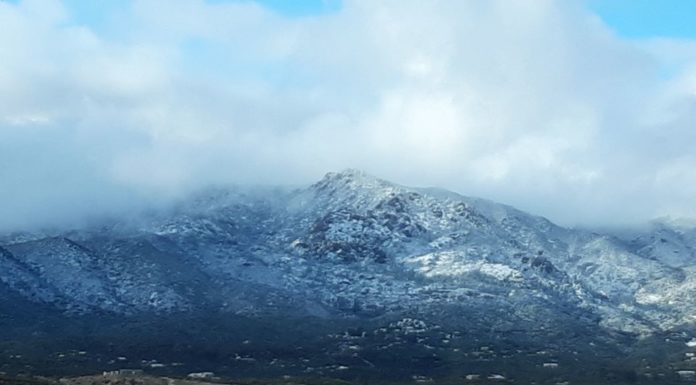 Weather Service reports record early rainfall, snow coming from cold northern storm tract