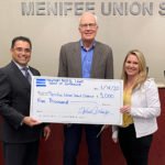 Menifee Union School District accepts $5,000 donation from Newport Pacific Land Steve Kennedy accepts a donation from Michael Schlesinger of Newport Pacific Land