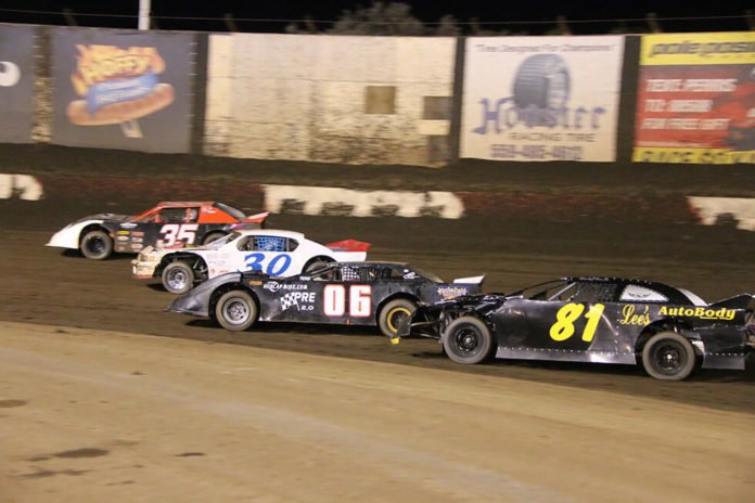 Cars racing at PASSCAR Super Stocks at the Perris Auto Speedway