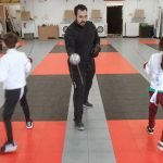 Partners duel in combat at Gryphon Fencing in Murrieta fencing