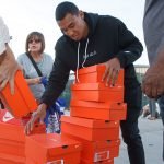 Murrieta’s Michael Norman gives back, donates shoes to local youth track athletes