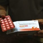 Heart woes spur partial stop of malaria drug study for virus