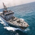 Navy fires captain who sought help for virus-stricken ship