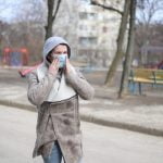 woman in mask park 2