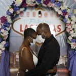 Using face masks and sanitizer, couples say ‘I do’ in Vegas