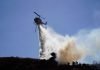 Grass fire damages home, threatens others in Temescal Canyon