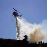 Grass fire damages home, threatens others in Temescal Canyon