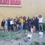 Protesters clean vandalized Black Angus restaurant