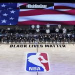 Players, coaches kneel before NBA’s re-opening night