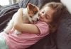 Adopters can help Animal Friends of the Valleys receive a Holiday Wishes grant Girl hugging dog
