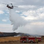 PHOTOS: Car fire sparks brush fire in Winchester