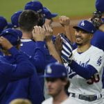 Bellinger, Betts rally Dodgers, cut Braves’ NLCS lead to 2-1