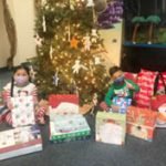 Discovery Isle Preschools donate pajamas and books to Project T.O.U.C.H.