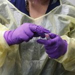 California virus surge brings body bags, makeshift morgues