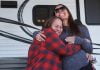 Family receives trailer for Christmas thanks to lending firm, community