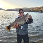 Russell Kitchen lands rainbow trout at Lake Hemet