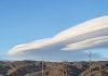 Lenticular clouds appear over Anza