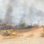 Blaze erupts adjacent to Banning High School, prompting evacuations