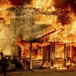 Fires rage in several states as heat wave broils U.S. West