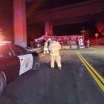 Driver dies after truck flies off freeway onto Dulin Rd. below