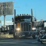 Car, semi collide on 60 freeway, pushing smaller vehicle under truck