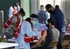 California to mandate COVID-19 vaccines for health workers
