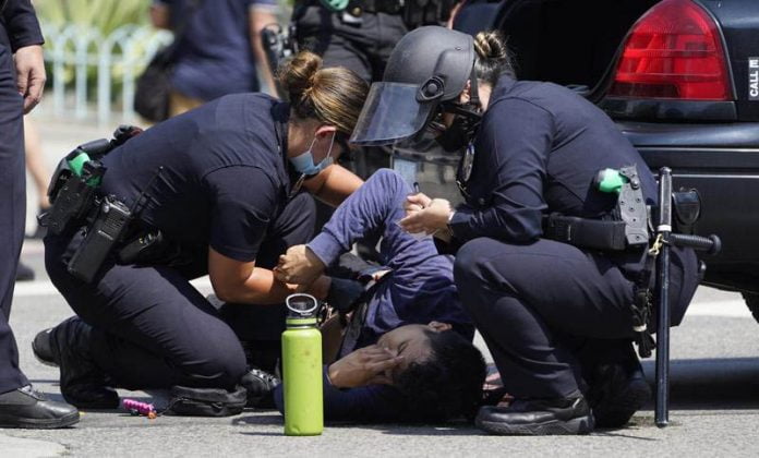 08-20-21-REGIONAL-Man stabbed at LA anti-APphoto