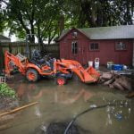 Henri’s lazy remnants hinder cleanup, threaten inland floods