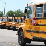 Car slams into school bus at Winchester intersection, injuring bus driver