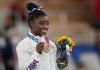 Biles returns to Olympic competition, wins bronze on beam