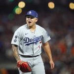 Urías hits, pitches Dodgers past Giants to even NLDS series