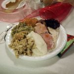 Local organizations present Christmas dinner at the Anza Community Hall