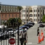 California prisons fight virus outbreaks amid staff concerns