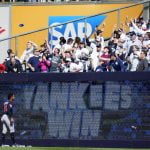 Yanks fans pelt Cleveland outfielders with debris after win